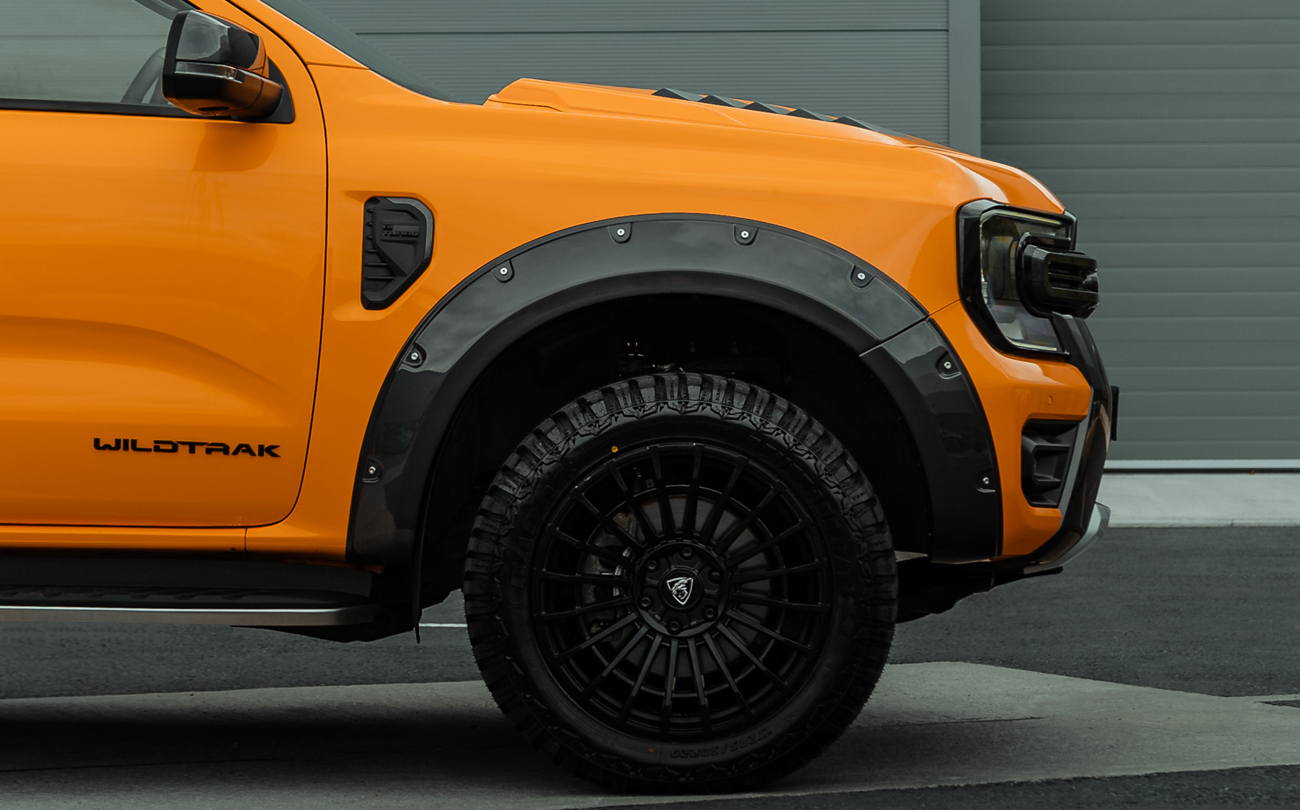 Cyber Orange Ranger fitted with Predator wheel arches and alloys
