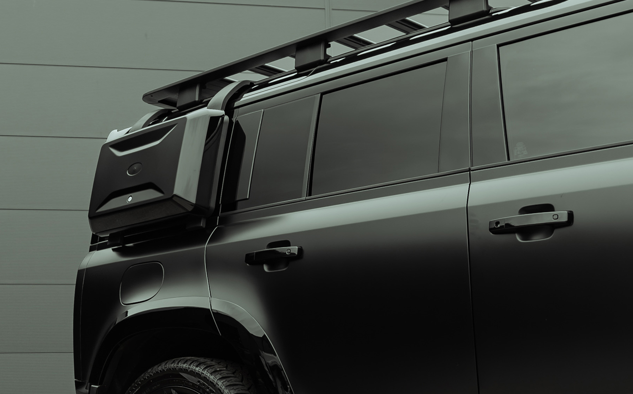 Satin Black Wrapped Defender 110